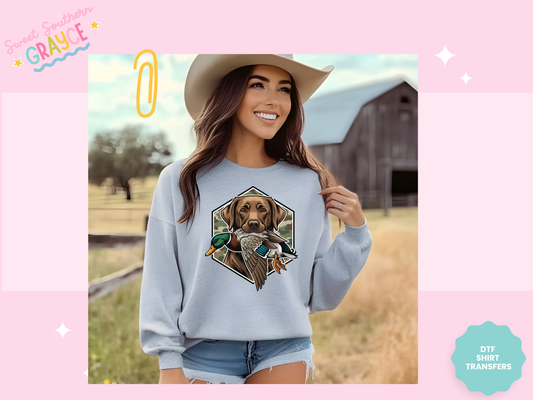 CAMO HUNTING DOG WITH DUCK